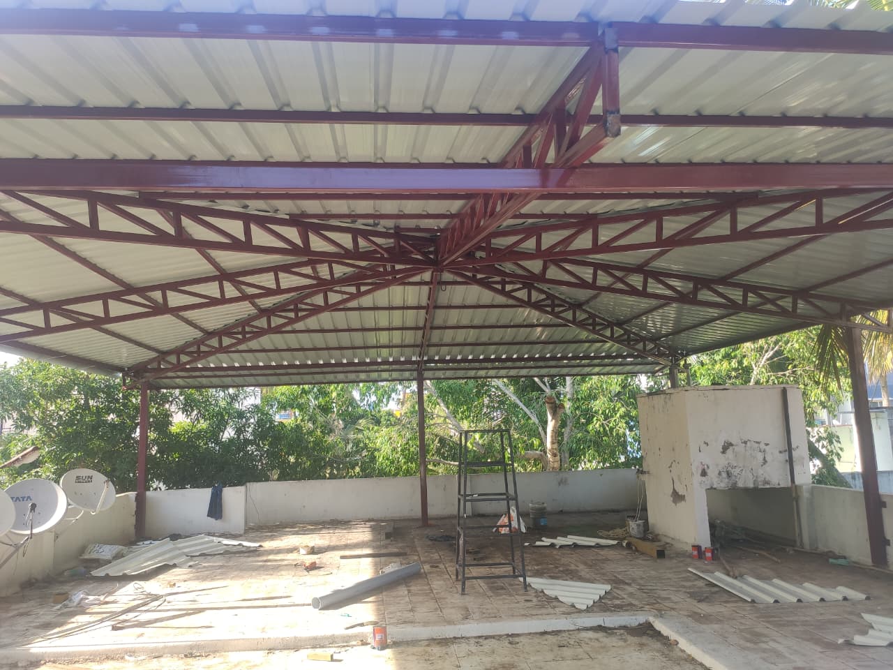 Finished custom steel canopy structure with corrugated roofing