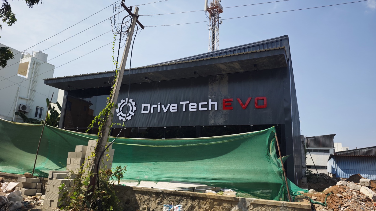 Commercial showroom entrance with steel and glass structure