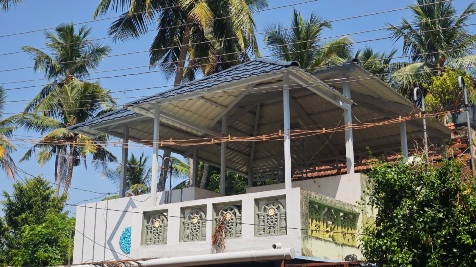 Palm-shaded terrace canopy, alternate view