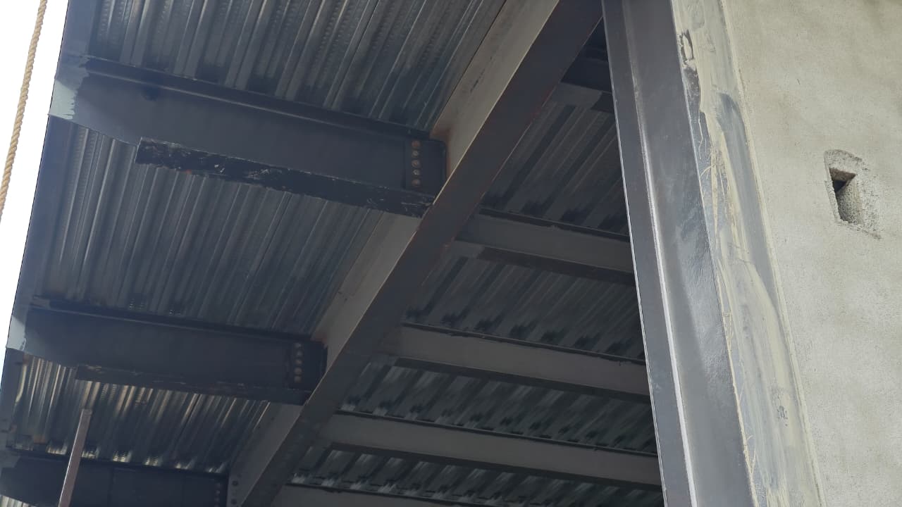 Close-up of steel beam joint detailing on a fabricated structure